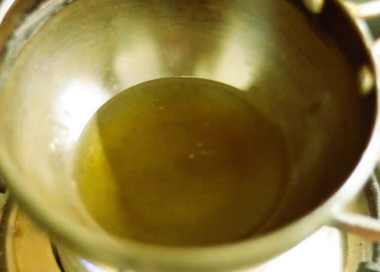 Steaming Hot Tempering Oil.