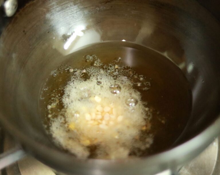 Frying Urad Dal for Tempering.