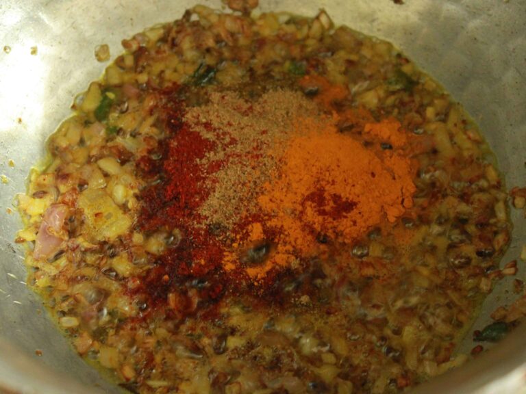 Enhancing masala with aromatic spices.