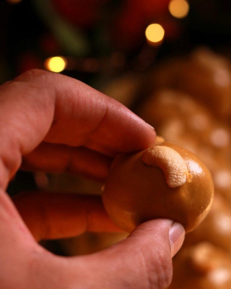 Hand picking Besan Laddu.