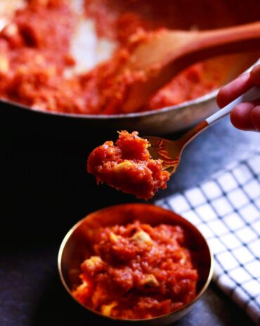 Warm carrot halwa on spoon