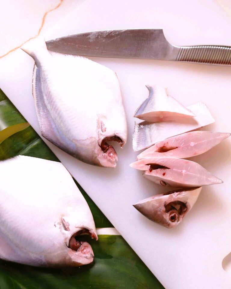 Fish being prepared for curry.