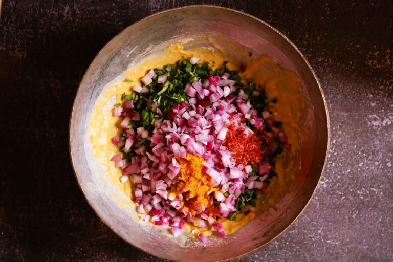 Flavorful pakora mix preparation.