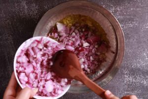 Onions sizzling in aromatic sauté.