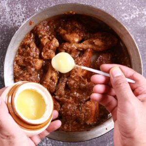 Ghee melting into aromatic chicken.