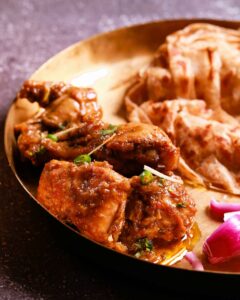 Sizzling Bhuna Chicken Delight.