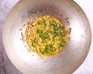 Sizzling wok with golden garlic.