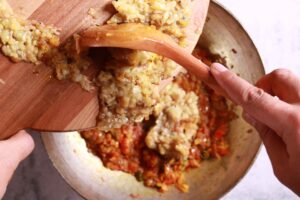 Mincing flavorful brinjal for Bharta.