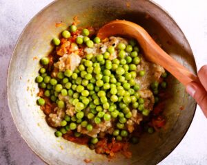 Blanched peas enhance rustic Bharta.