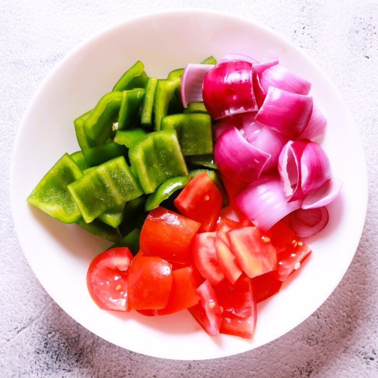 Colorful diced veggies arrangement.