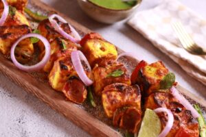 Serving aromatic oven-baked Paneer.