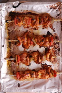 butter chicken Tikka tray in oven