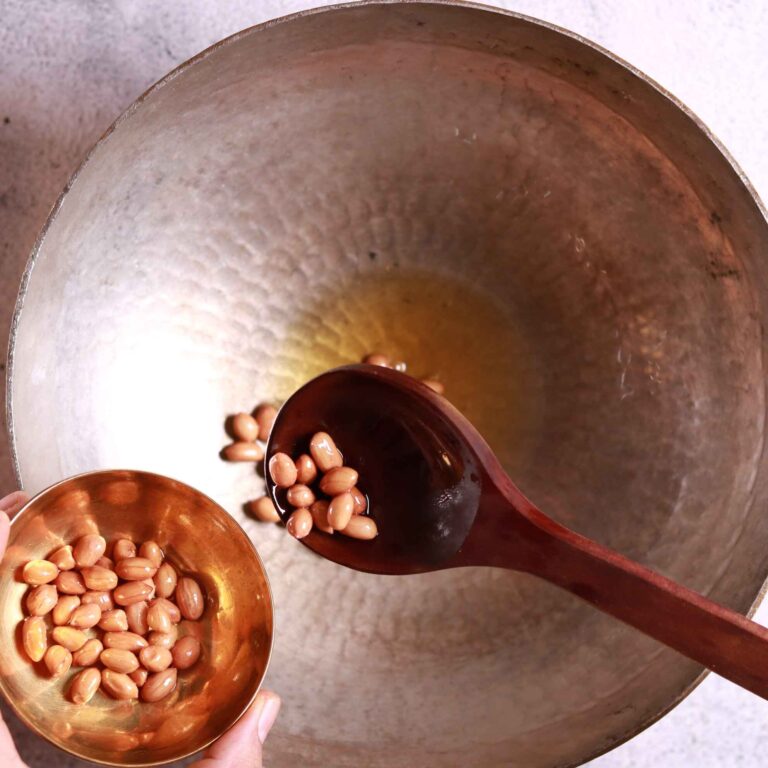 Frying peanuts in oil- Semiya Upma