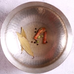 Spices sautéing in pan