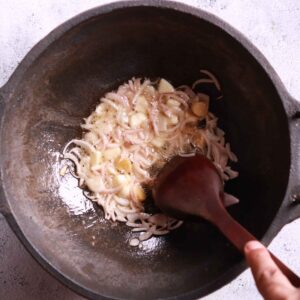 Sautéing onions garlic ginger in Goan Crab Curry Recipe