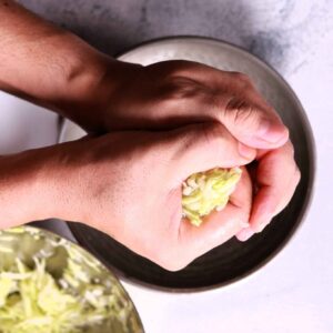 Mixing Lauki Ka Kofta ingredients