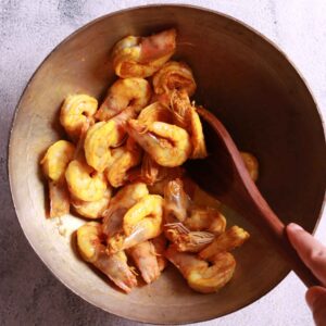 Sautéing prawns turning orange