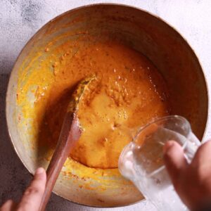 Simmering curry in pan