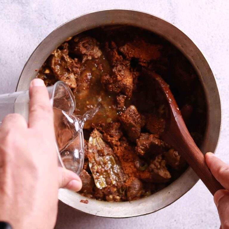 Adding water to the gravy of chicken liver fry recipe