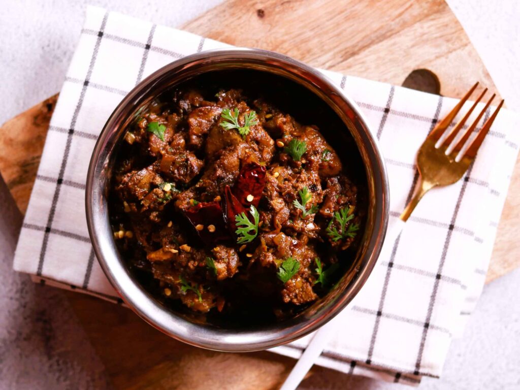 Serving Chicken Liver Masala