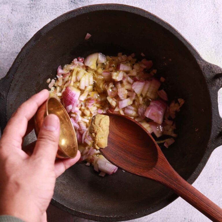 Onions sautéing with spice paste