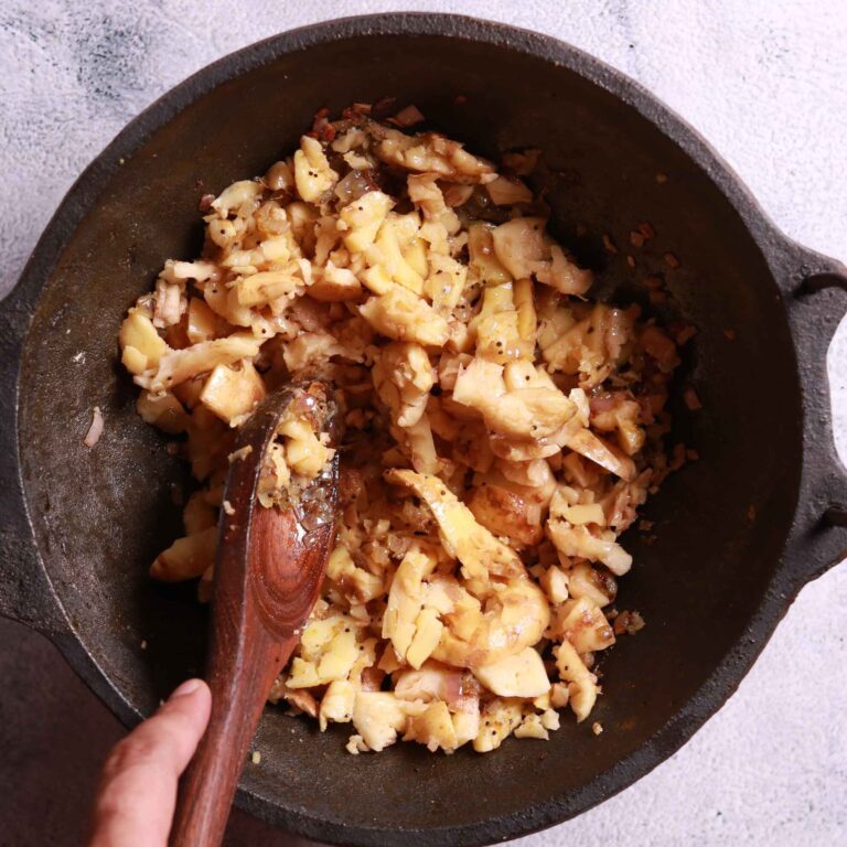 Spices added to crushed potatoes