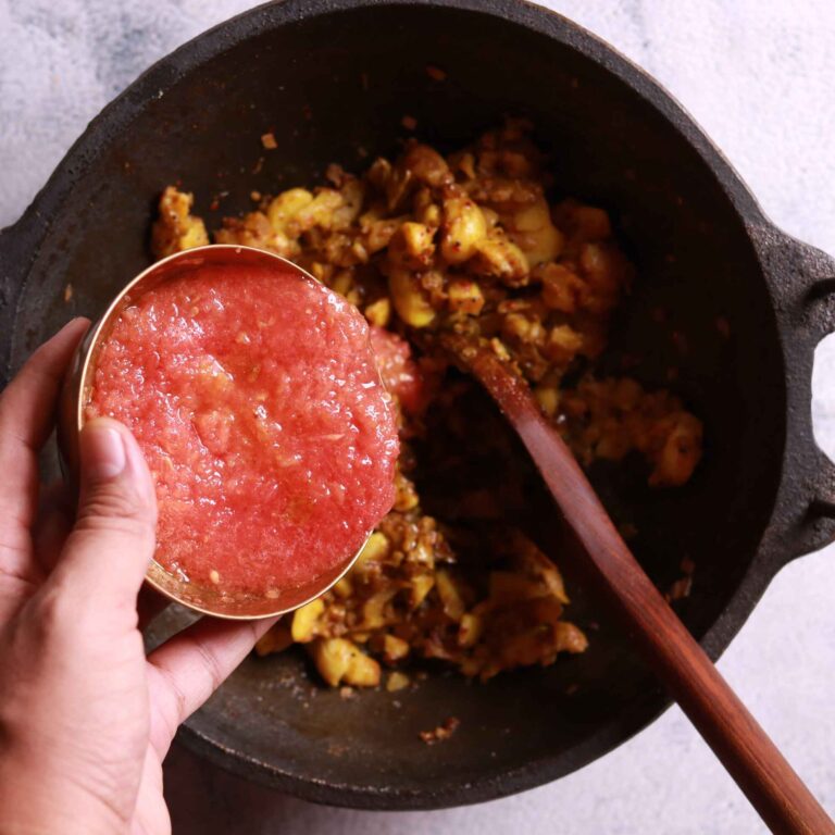 Tomato puree added to potatoes