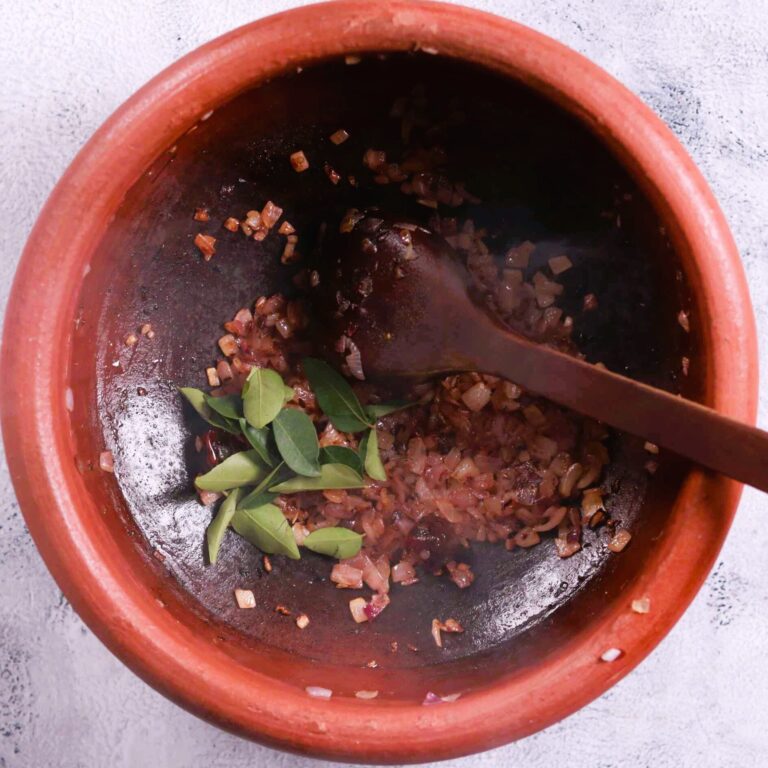 Adding curry leaves