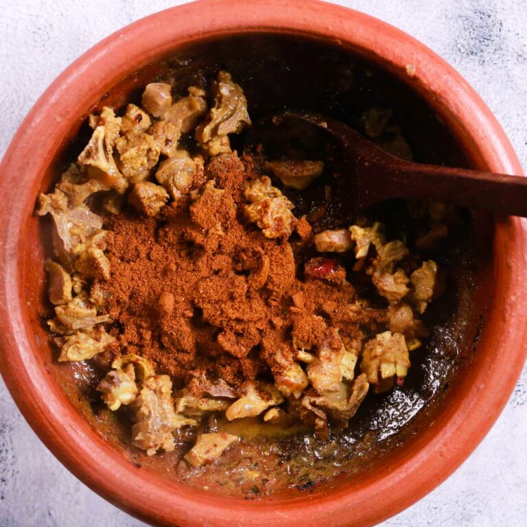 Adding mutton spices