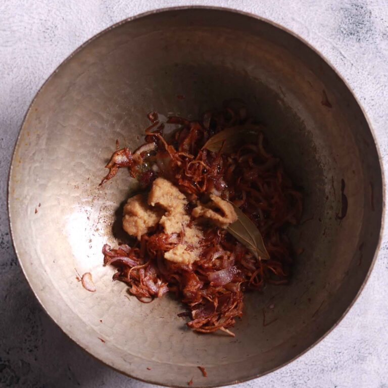 Stirring ginger-garlic paste in pan