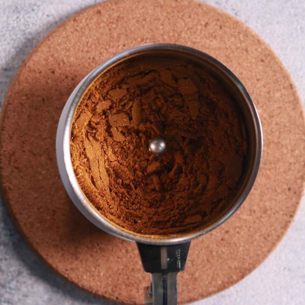 Grinding spices with turmeric
