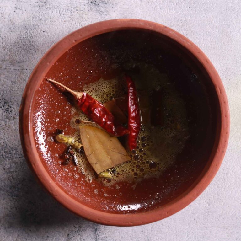 Adding whole spices to oil