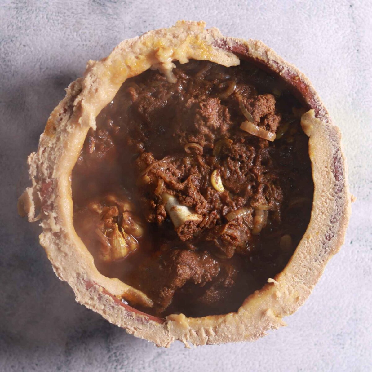Removing seal and lid from pot