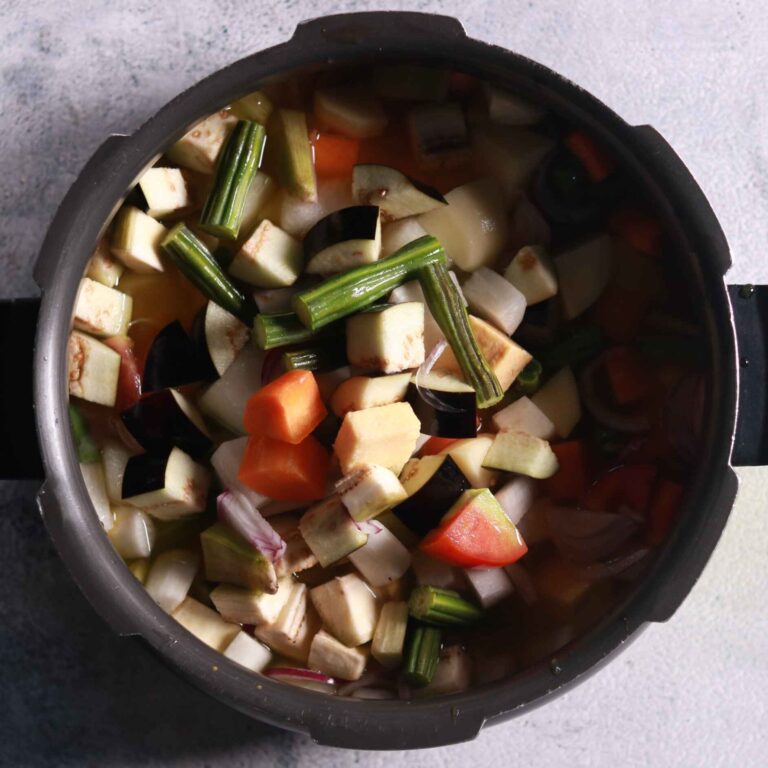 Adding vegetables to pressure cooker