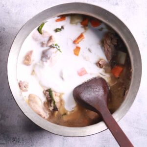 Adding sugar, cashew paste, and coconut cream