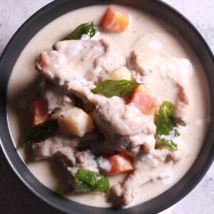 Serving chicken curry with parotta