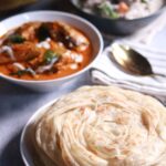 Serving parotha with curry