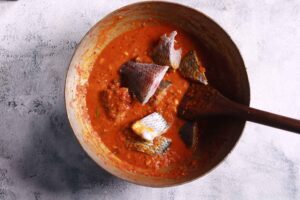 Fish cooking in curry