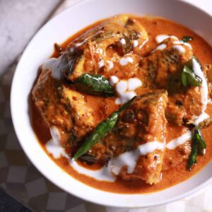 Kerala fish curry served