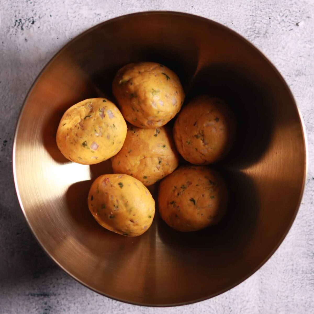 Shaping dough into balls