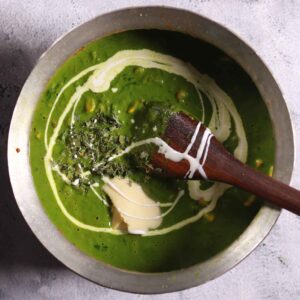 Adding cream and Kasuri methi