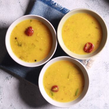 Serving lemon rasam