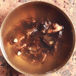 Straining tamarind pulp