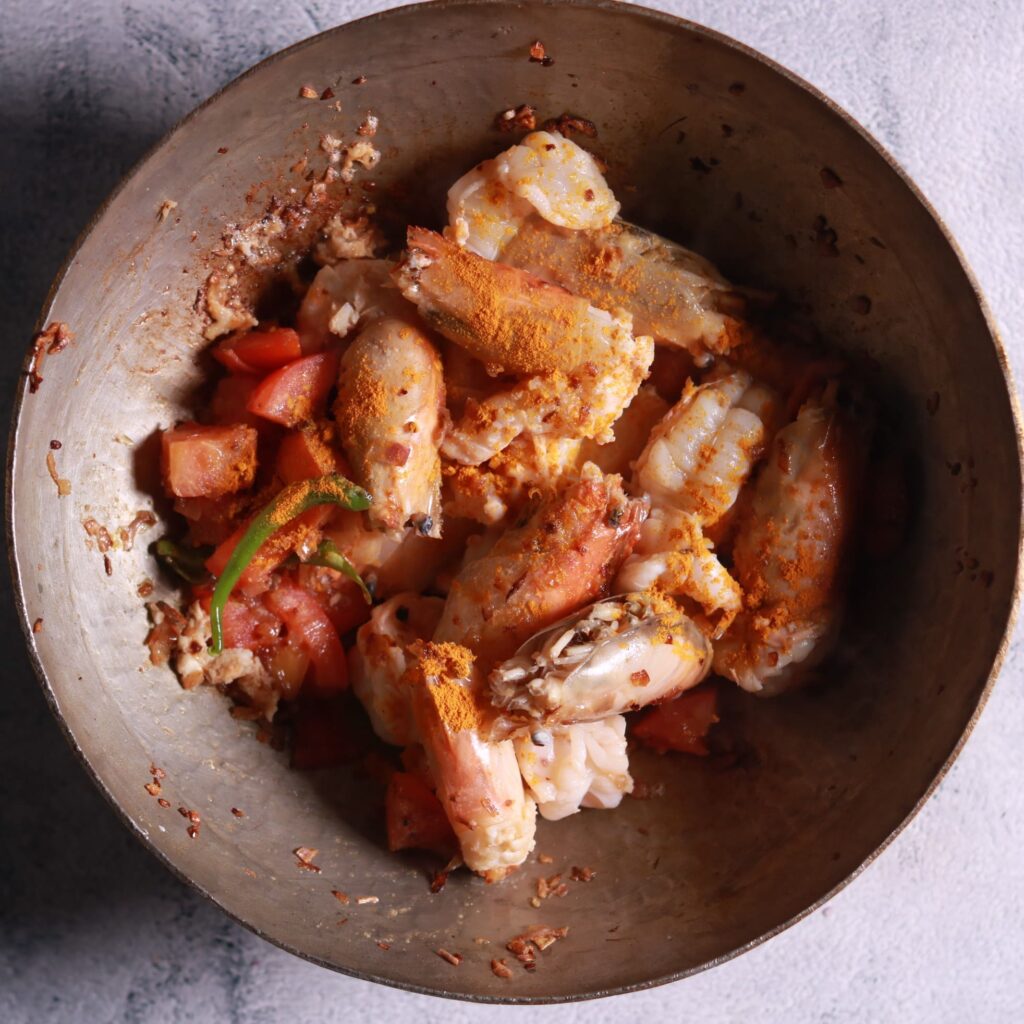 Stir-frying prawns