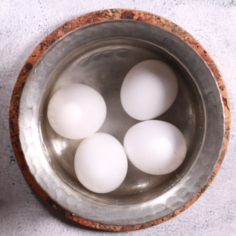 Boiling eggs in saucepan