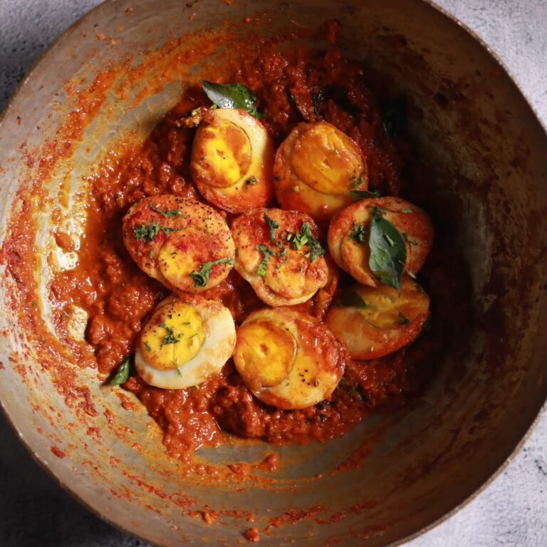 Mixing eggs masala