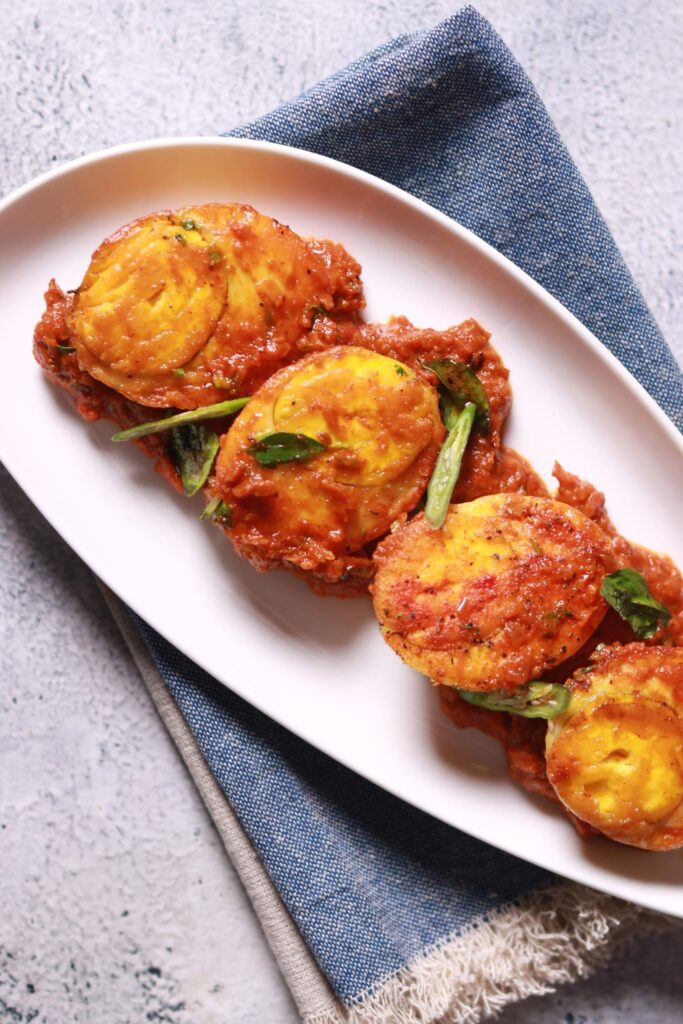 Egg masala serving