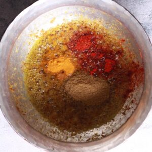 Spices cooking until fragrant aromatic
