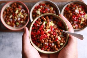 Tasting and adjusting chana seasoning