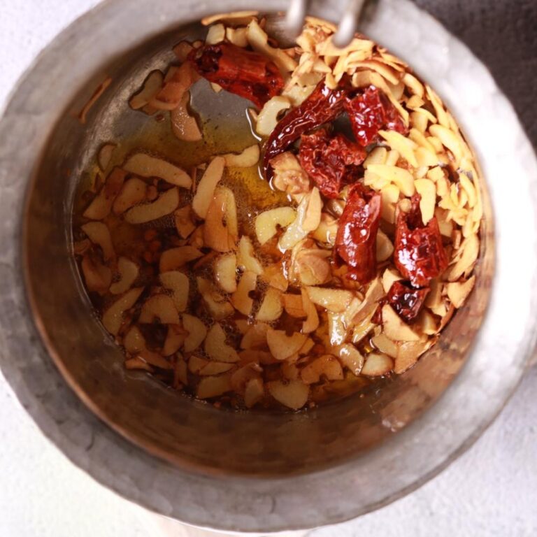 Garlic slices frying golden